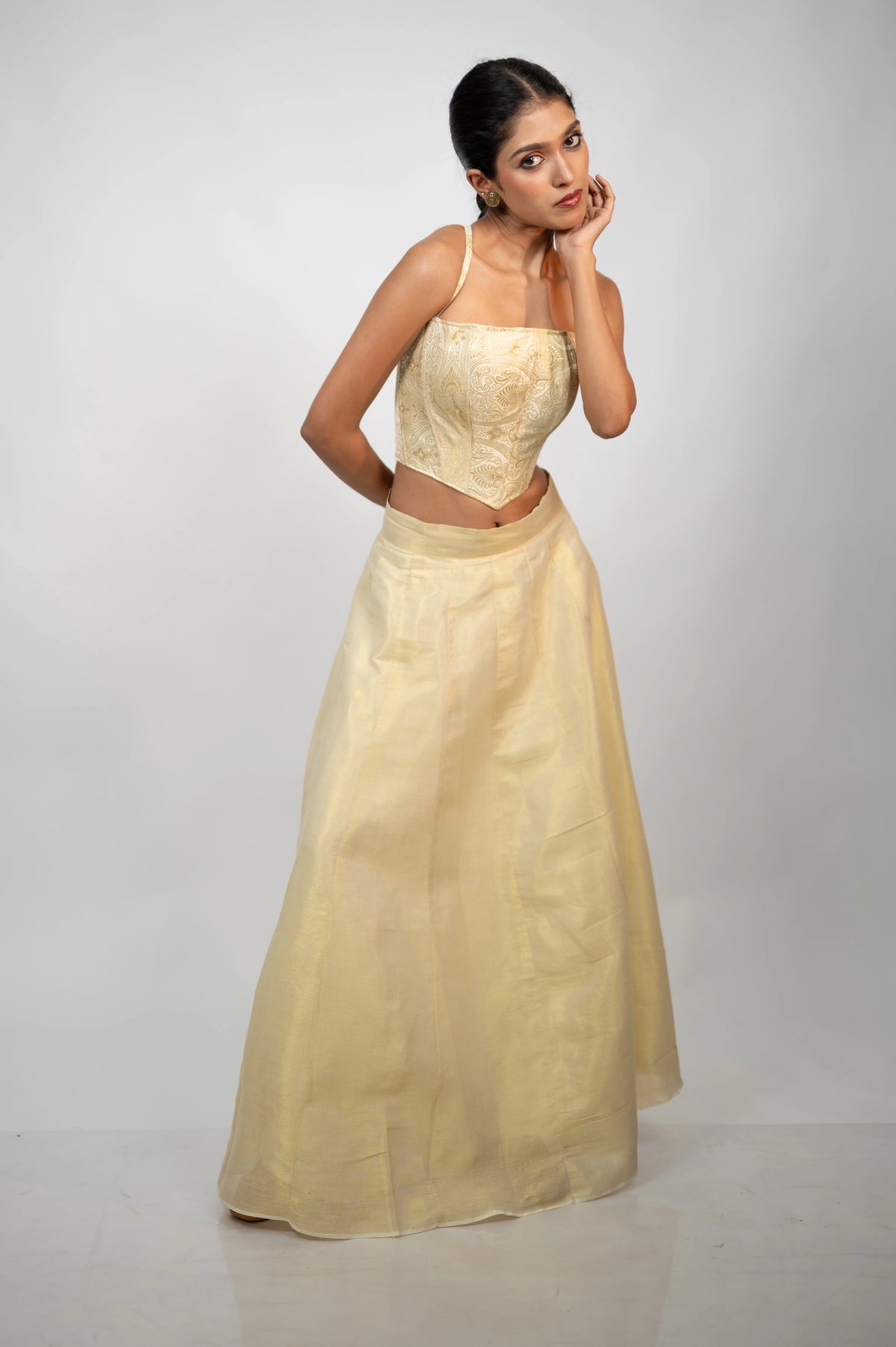 Aurelia ivory gold brocade corset styled with an ivory skirt