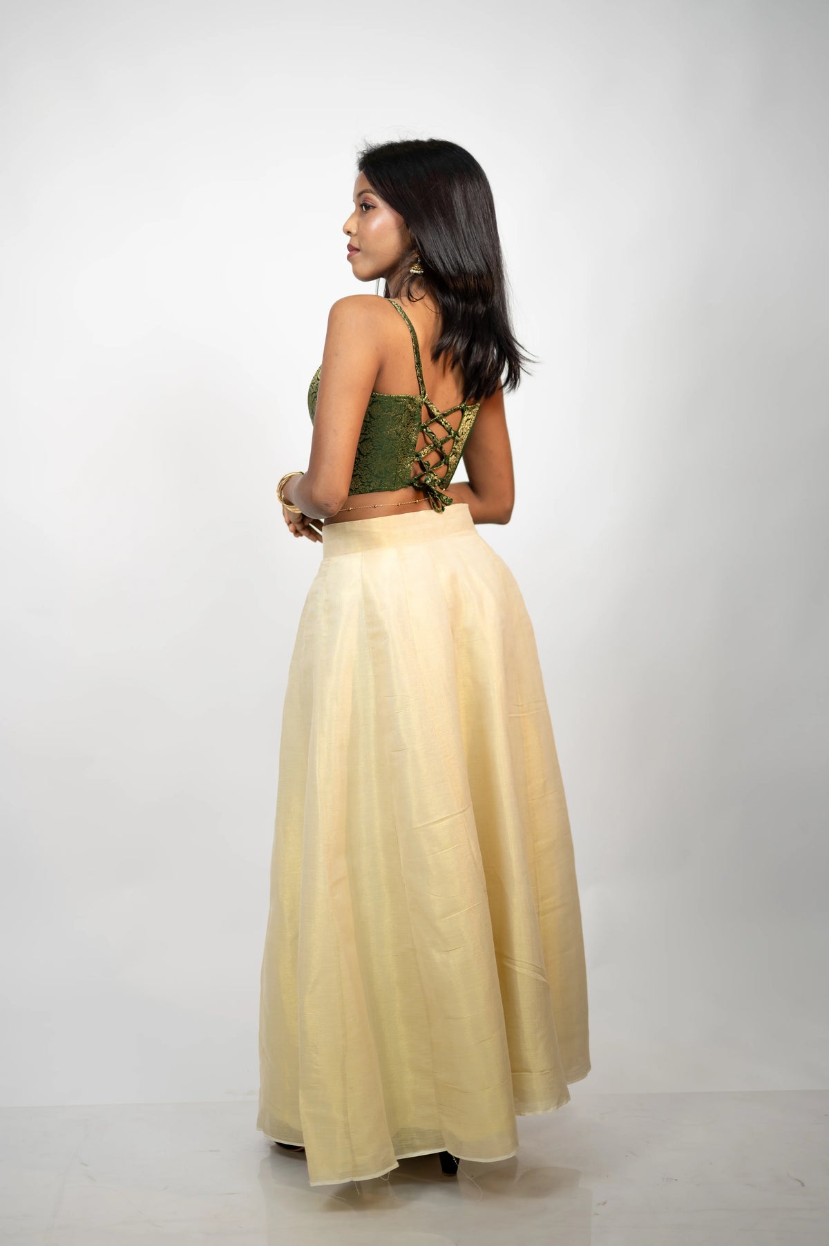 Emerald Elan green brocade corset with adjustable criss-cross lace-up back