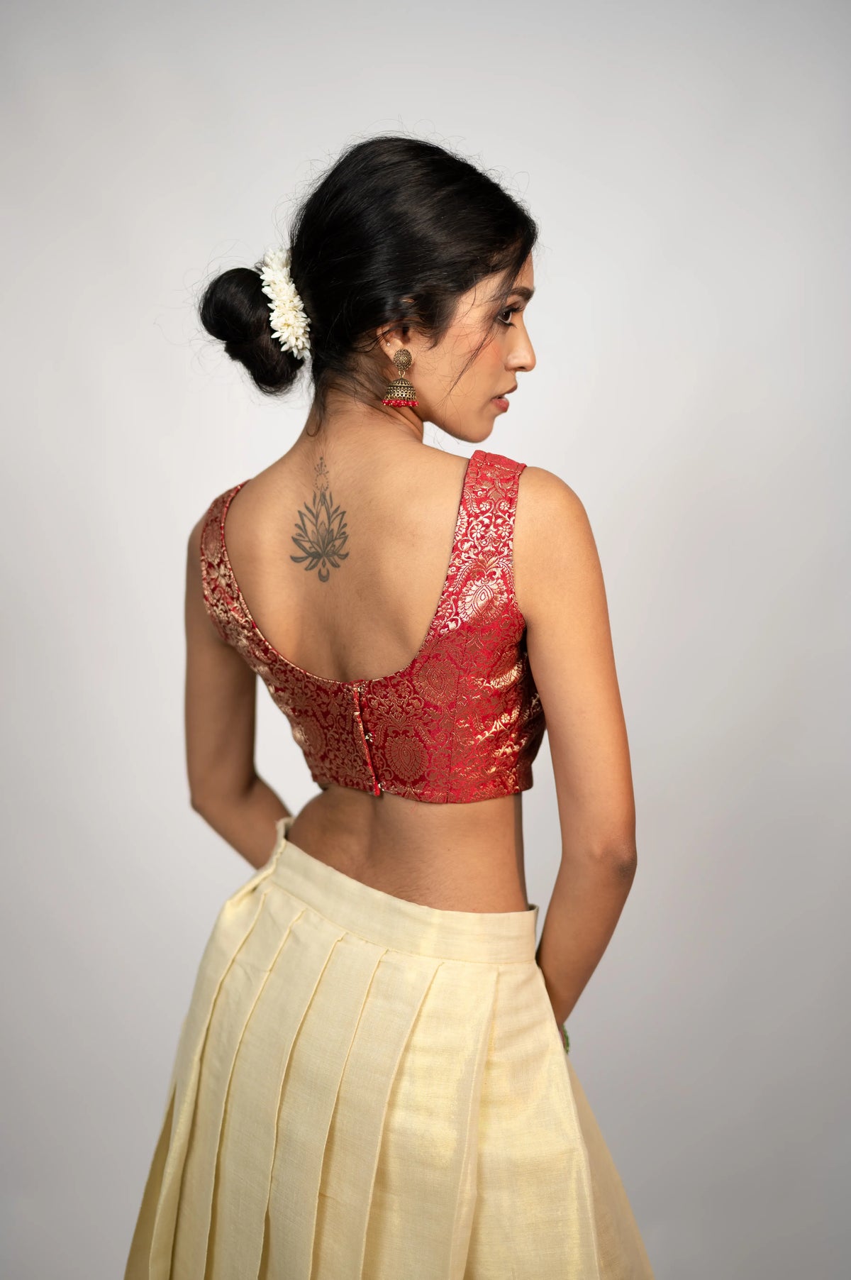 Gulnaar Royale crimson brocade corset back view with hook-and-eye closure