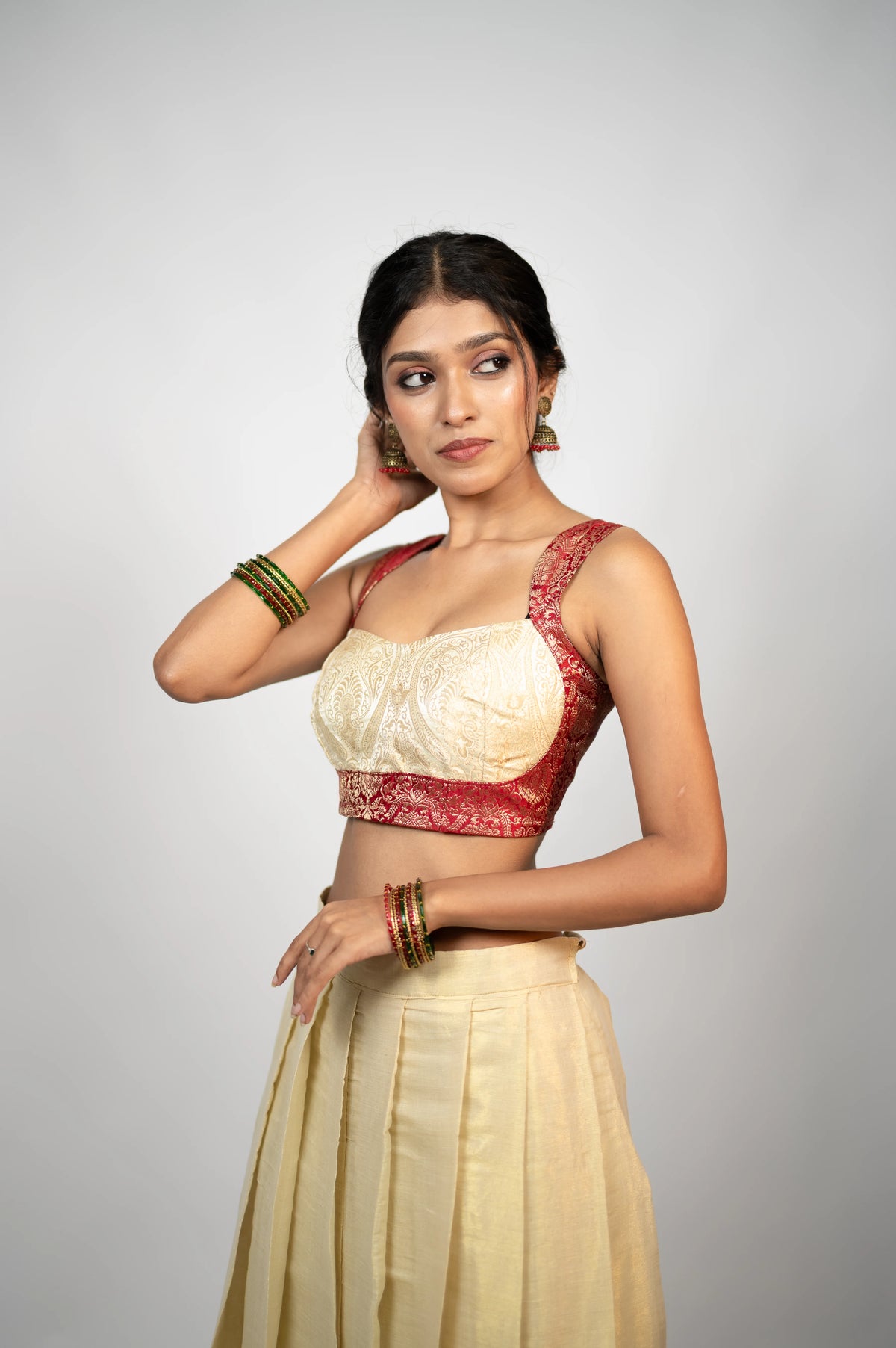 Gulnaar Royale ivory and crimson brocade corset three-quarter front view